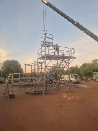 Elevated steel platform welding crane lift