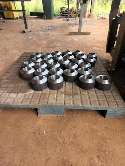 Batch machined steel threaded sockets