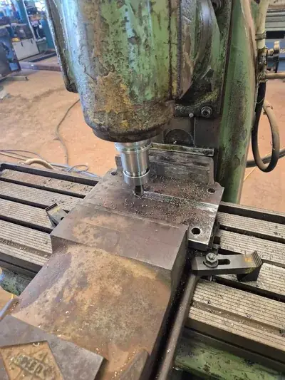 Radial drill press steel machining