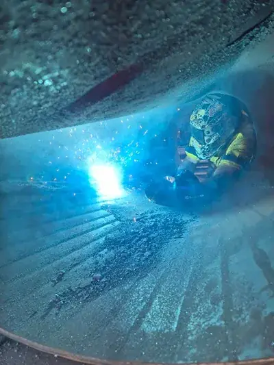 Confined space tank welding blue arc
