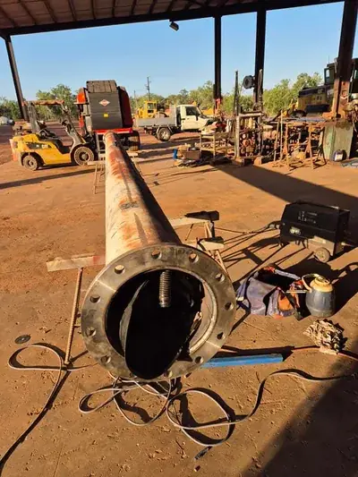 Pipe flange weld fabrication yard