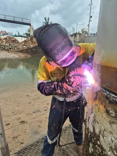 Pipe welding waterfront canal site