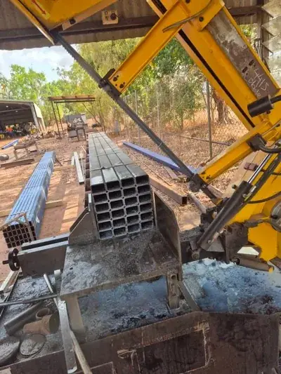 Bandsaw cutting steel square tube